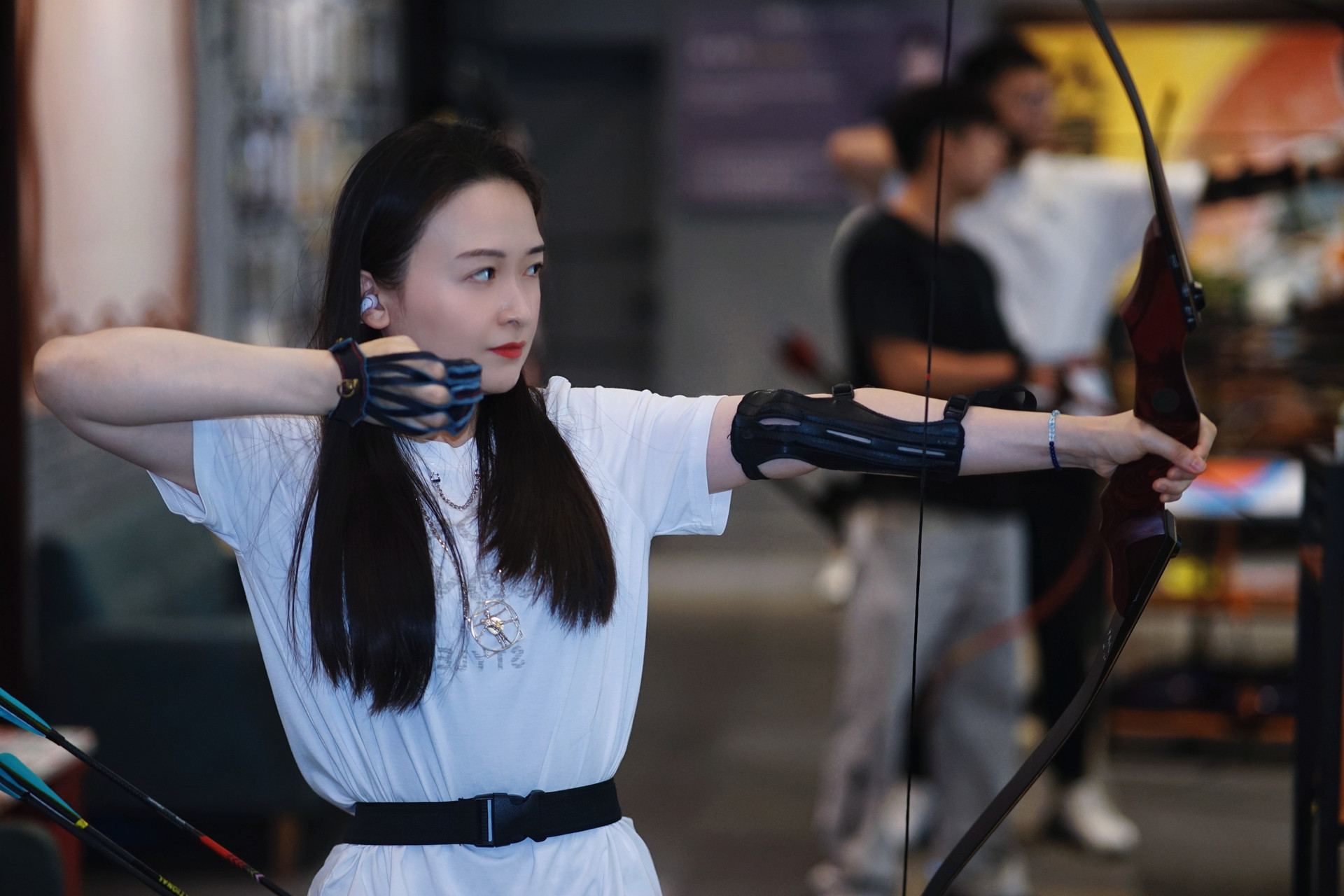 Shixi Lin practicing archery